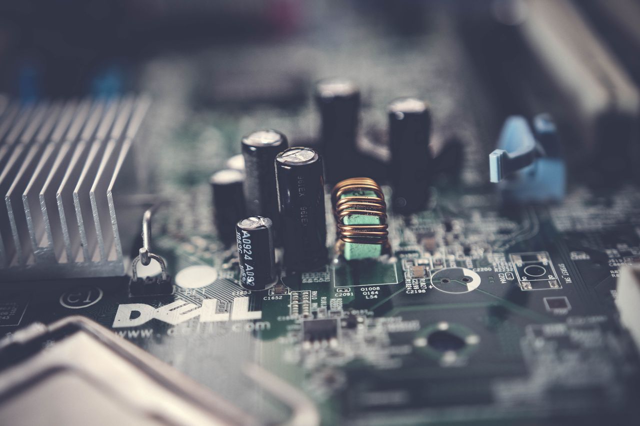 about-04 Detailed close-up of a motherboard showcasing electronic components and circuits.
